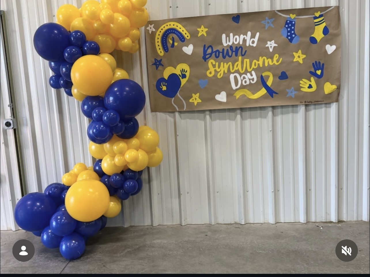 Blue and yellow balloon garland for World Down Syndrome Day